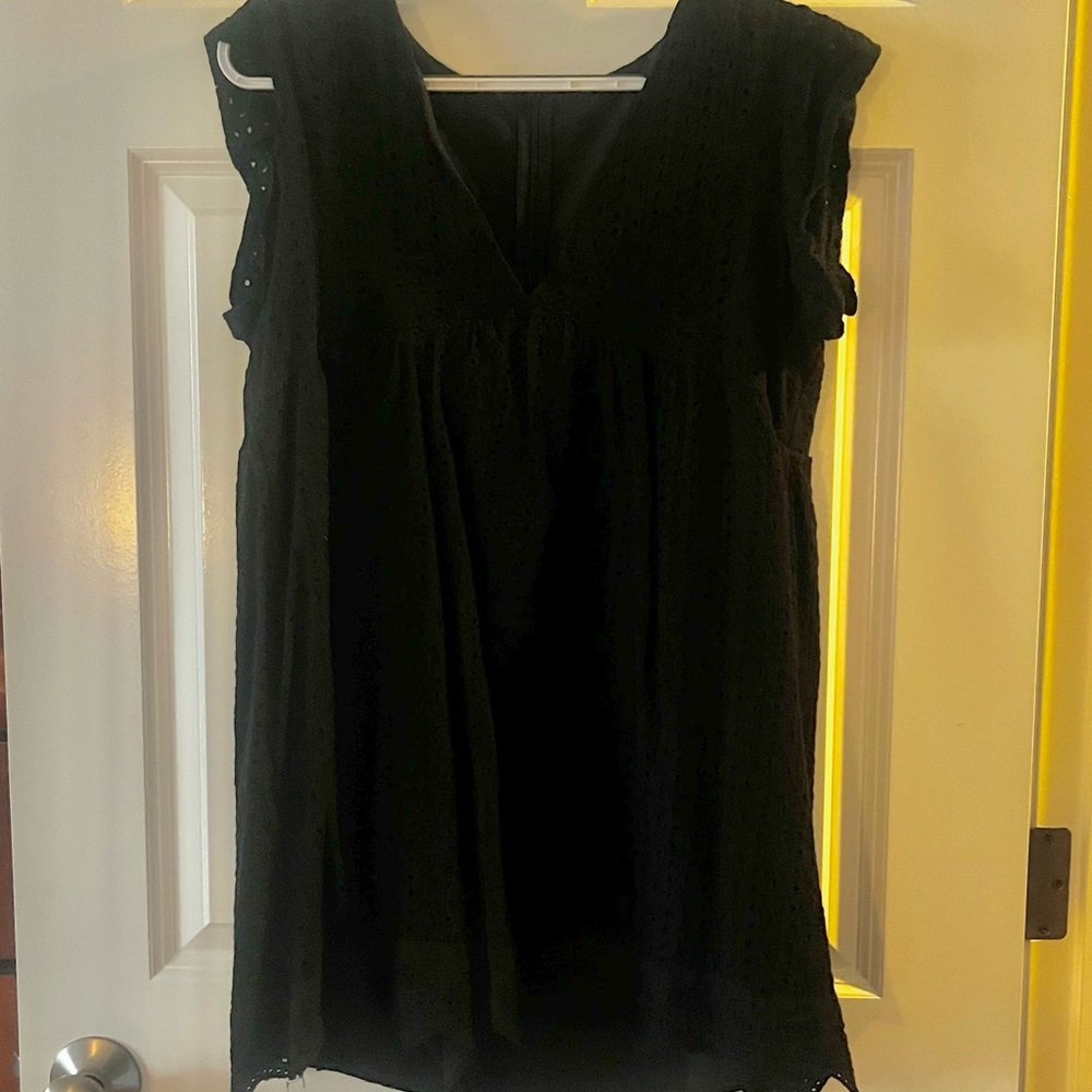 Black eyelet romper with pockets